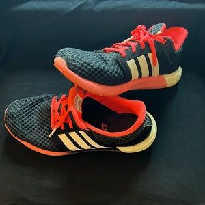 Adidas running shoes. Used but lots of life left.
